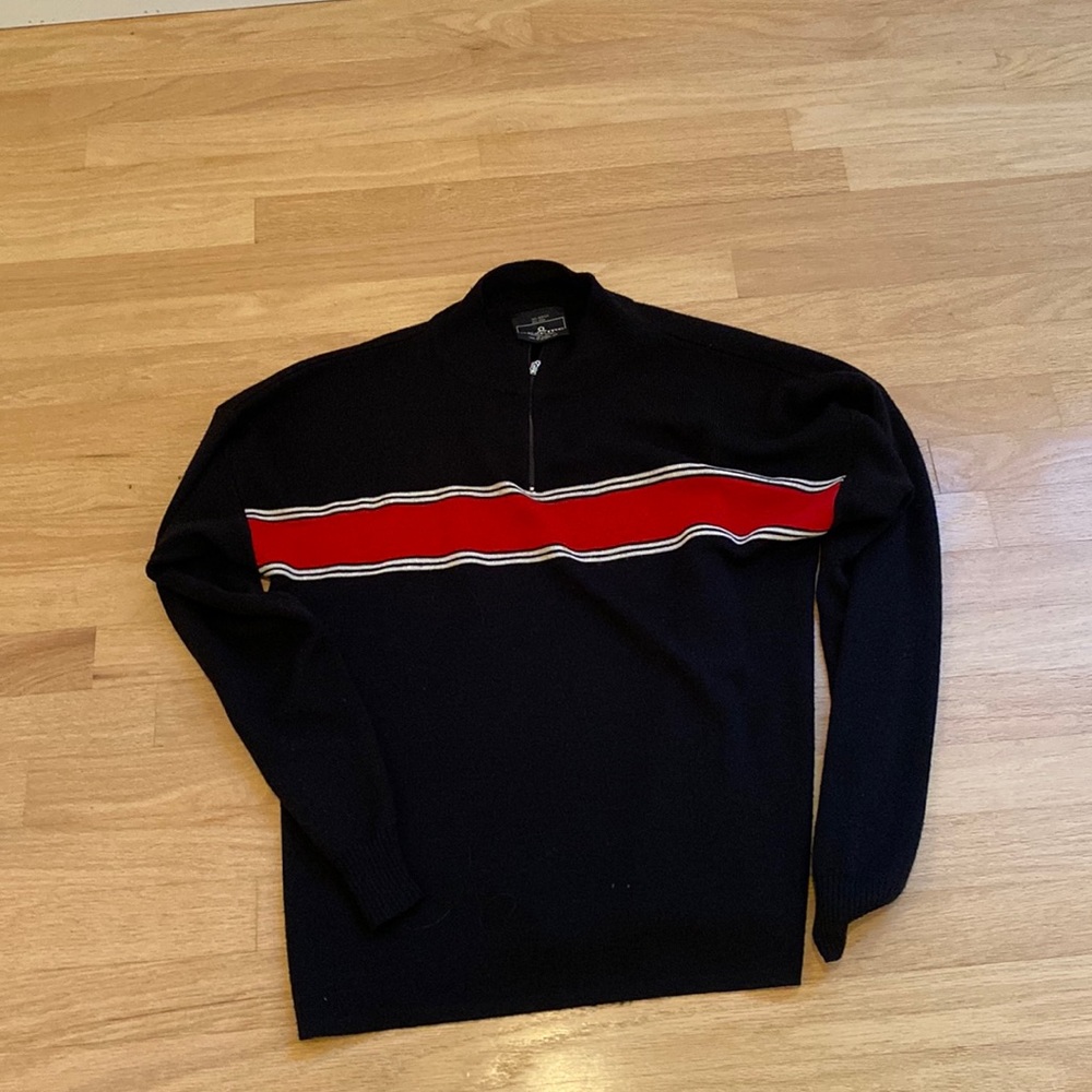 Wool and acrylic black ski sweater with red and white stripes